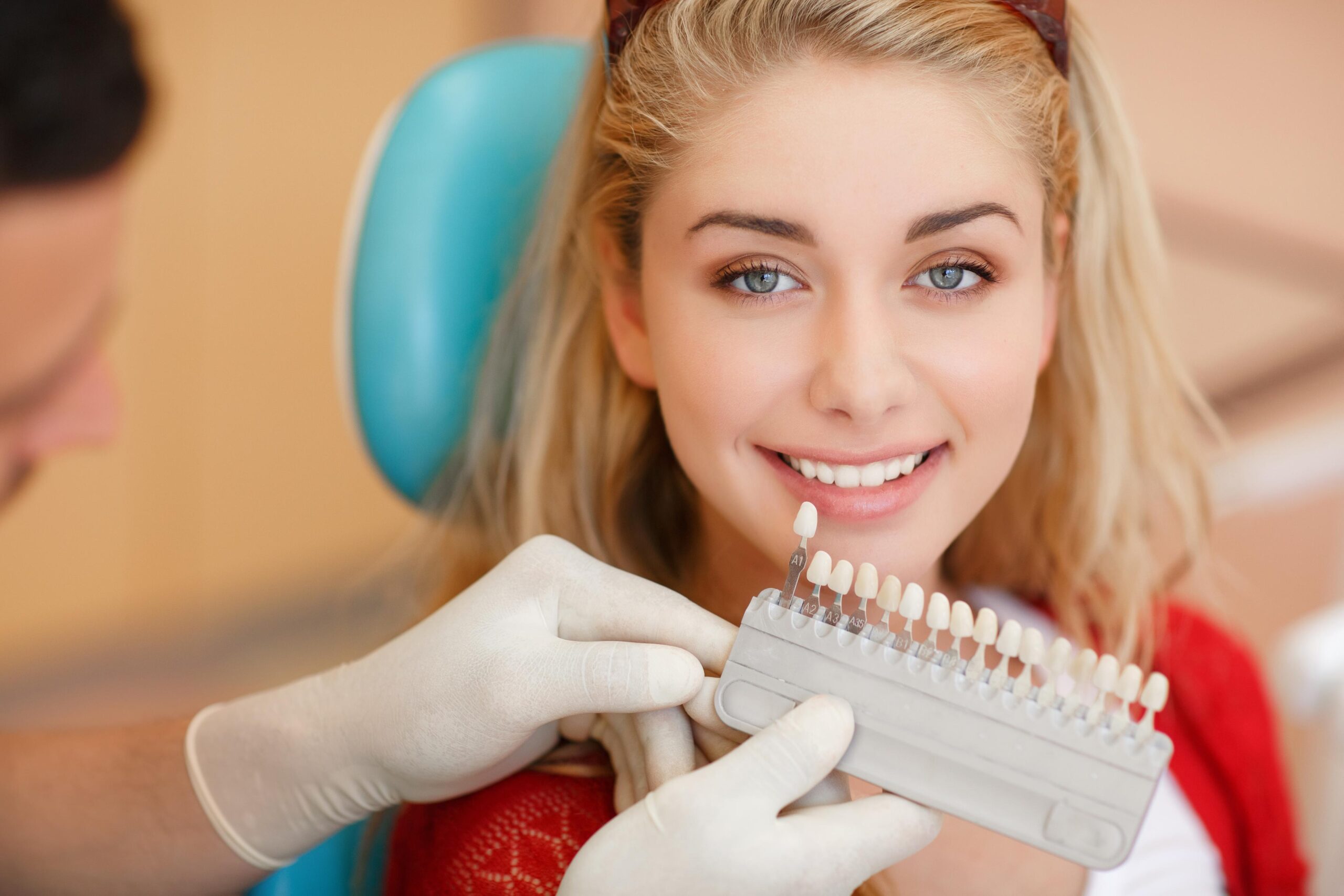 girl with the teeth whitening tool